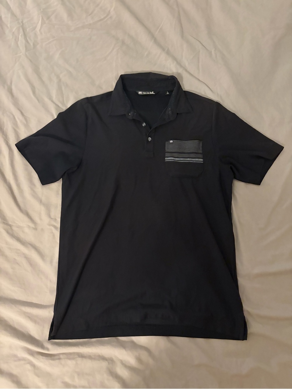 TravisMathew Black Short-Sleeve Polo with Striped Chest Pocket